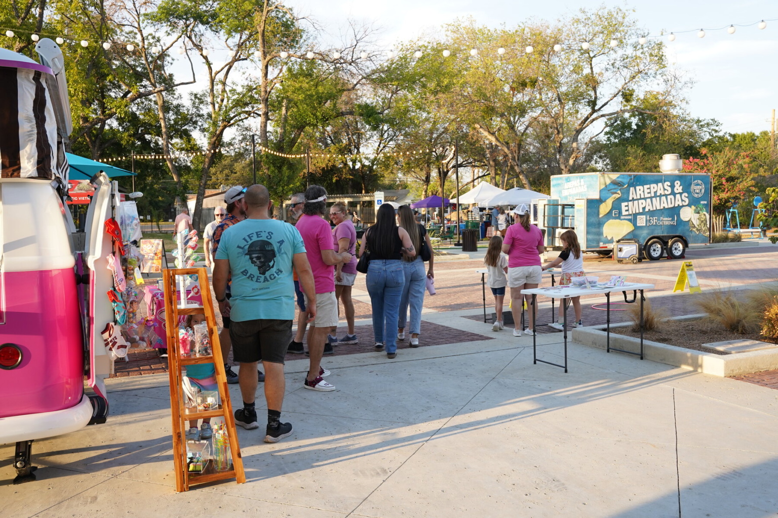 Guests browse vendor booths along Bates Street at the first Depot Nights on September 25, 2026.